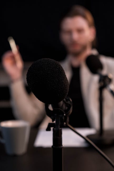 Close-up of a studio microphone representing podcast content